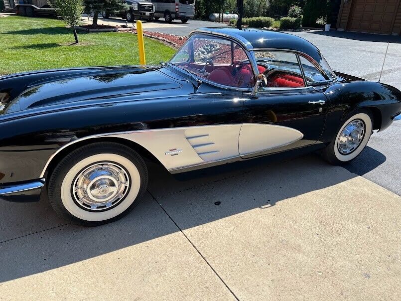 1961 Chevrolet Corvette convertible with removable hard top.283 dual quad carbs